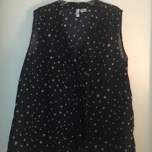 Navy blue polka dot sleeveless blouse
